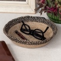 Conical jute bowl in natural and black.