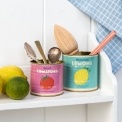Decorative storage tins labelled "Spiced Tomatoes" and "Moroccan Lemons"