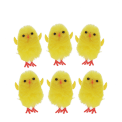 Six fluffy yellow chick decorations displayed side by side.