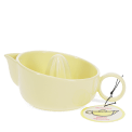 Yellow stoneware lemon squeezer with handle, spout and an attached product tag.