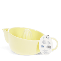 Yellow stoneware lemon squeezer with handle, spout and an attached product tag.