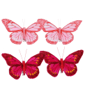 four butterfly clip decorations in light pink and dark pink,