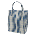 Blue and white striped woven shopping bag with handles.
