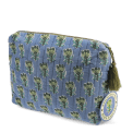 Blue quilted wash bag in blue with a green and blue floral print and a tag.