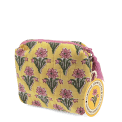 Yellow quilted cosmetic bag with a pink and green floral print and a pink tassel on the zip with tag.
