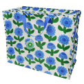 Large storage bag with a blue floral pattern and blue handles with tag.