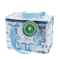 Insulated lunch bag with a light blue bow pattern and light blue handles with tag.
