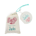 Traditional Jacks in a drawstring bag with a round tag attached.