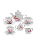 Unicorn‑patterned ceramic tea set with cups, saucers and teapot