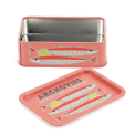 Open pink mini storage tin with the lid beside it, featuring an illustrated anchovies on the lid.
