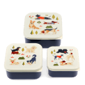 Set of three snack boxes with cream lids featuring playful dog illustrations 