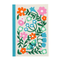 Notebook with colourful illustrated flowers, leaves, and butterflies on the cover.