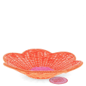 A shallow orange woven plastic basket with a flower-shaped and a pink centre with tag.