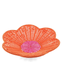 A shallow orange woven plastic basket with a flower-shaped rim and a pink centre.