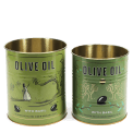 Two green olive oil storage tins, featuring illustrated trees and olives.