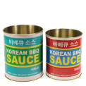 Two colourful Korean BBQ sauce storage tins