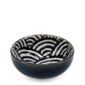 Round ceramic bowl with white wave pattern interior