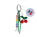 Crochet cherry bag charm with green cord strap, colourful beads and tag.