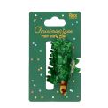 Green Christmas tree-shaped hair claw clip on festive retail packaging.