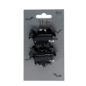 Set of two black bat-shaped hair claw clips on Halloween-themed retail packaging.