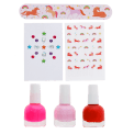 Unicorn nail kit contents including three nail polishes, a unicorn nail file, and unicorn-themed nail stickers.