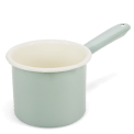 Pistachio green enamel milk pot with white interior and long handle.