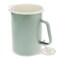 Pistachio green enamel jug with pour spout, white interior and 1.7 litre capacity shown with a tag.