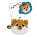 Crochet fox-shaped coin purse with a metal clasp and hanging bell charm with tag.