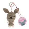 Crochet rabbit keyring with long ears and a silver metal keyring attachment with tag.
