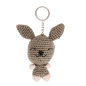 Crochet rabbit keyring with long ears and a silver metal keyring attachment.