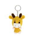 Crochet giraffe keyring with small horns and a silver metal keyring attachment.