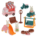 Ice Cream Playground playset with toy ice cream van, slide, swing and bunny figures.