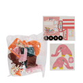 Ice Cream Playground playset parts in packaging with sticker sheets, bunny figures and accessories.