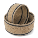 Set of two round woven storage baskets with black stripe detail.
