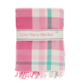 check pattern in pink, white and teal blanket