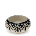 Round ceramic tealight holder with black zigzag pattern