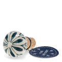 Ceramic and cork bottle stopper with leaf design with tag.