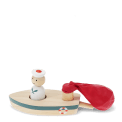 Wooden balloon-powered toy boat with detachable balloon and illustrated storage box