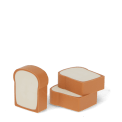 Three slice-shaped bread erasers with crust-coloured edges and white centres