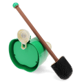 Green apple-shaped wall-mounted toilet brush with holder and black bristle head
