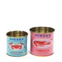 Ocean-themed decorative storage tins labelled "Ocean Crab" and "Lobster"