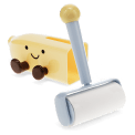 Banana-shaped holder with smiling face and lint roller