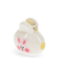 Bunny-themed travel toothbrush case with pink rabbit face 