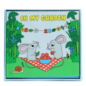 Baby first book featuring a mouse in a garden scene.