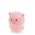 Pink pig-shaped squishy toy with smiling face and soft rounded design
