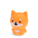 Orange dog-shaped squishy toy with smiling face and soft rounded design