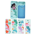 Open mermaid magnetic dress-up set with illustrated tin case and interchangeable magnetic outfit pieces.