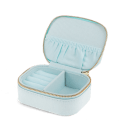 Open light blue jewellery box with ring rolls, storage compartments and interior pockets.