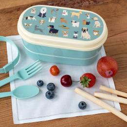 Blue-green plastic bento box with cream lid and middle tray featuring illustrations of dogs