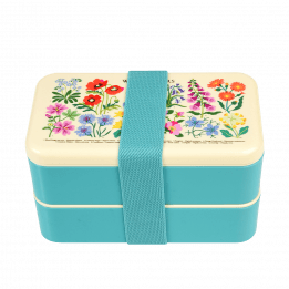 Turquoise adult bento box with cream lid and middle tray plus turquoise elastic strap featuring wild flower pattern
